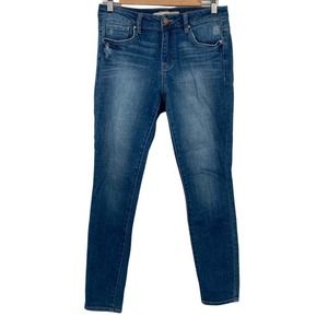 Statement Mid-Rise Medium Wash Lightly Distressed Stretch Skinny Jeans